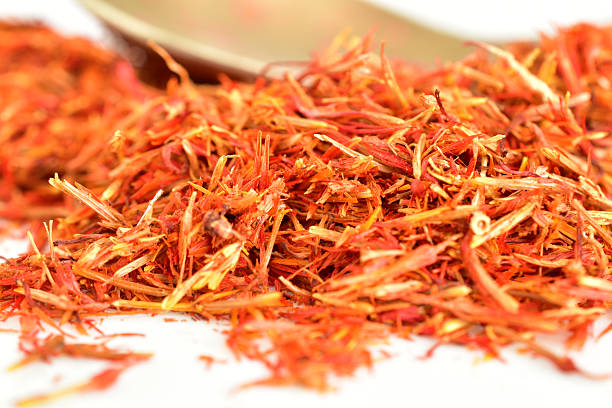 Food spice saffron lies on a white background.